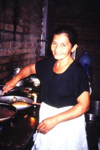 torola-woman-cooking-in-her-kitchen