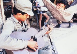 young-nicaraguan-soldier-playing-guitar-photo-from-alma-blount